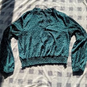 Green polka dot blouse